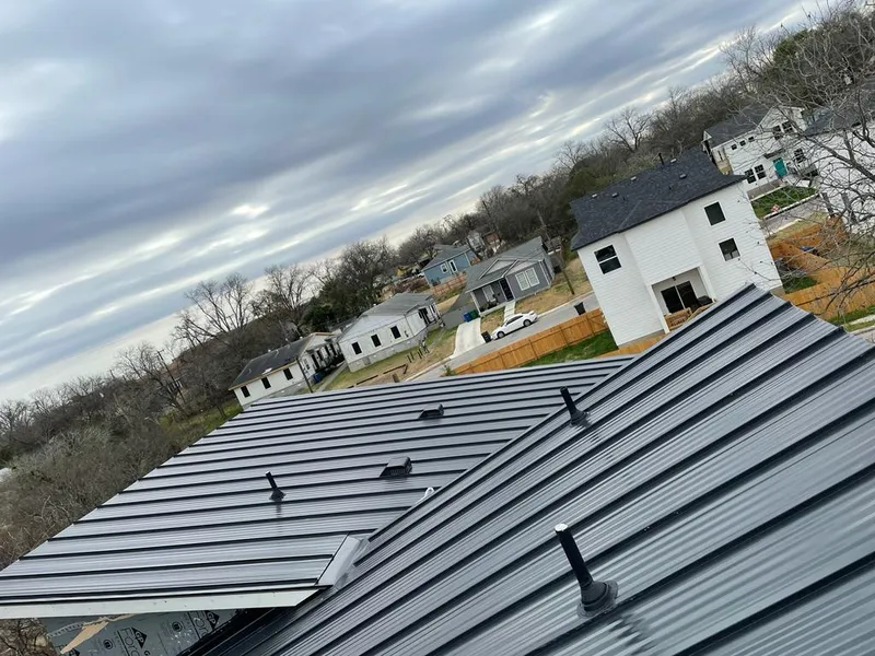 Standing seam metal roof panels with vents for Skylight Repair in Madison